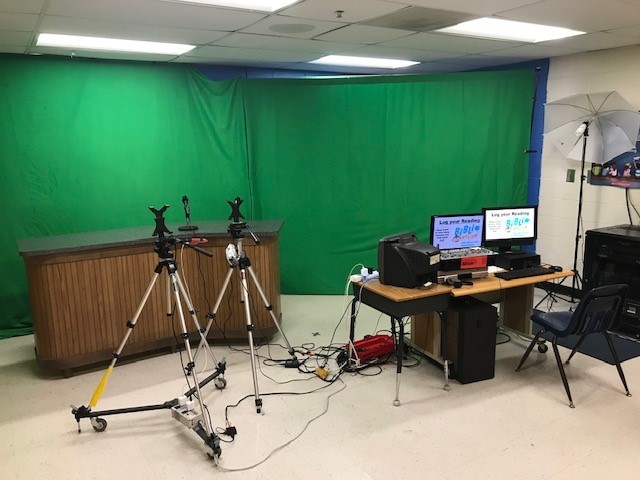photo of the news room set-up with green screen and 